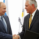 Putin and Tillerson shake hands at a signing ceremony of an agreement between state-controlled Russian oil company Rosneft and Exxon Mobil corporation at the Black Sea port of Tuapse, southern Russia, Friday, June 15, 2012. Photo via AP